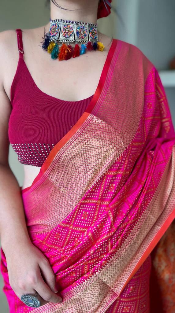 Pure Patola Silk Saree With All Over Contrast Patola Weaved With Contrast Meenakari And Rich Pallu With Tassels Attached Saree in Pink - Perfect for Partywear / Bollywood