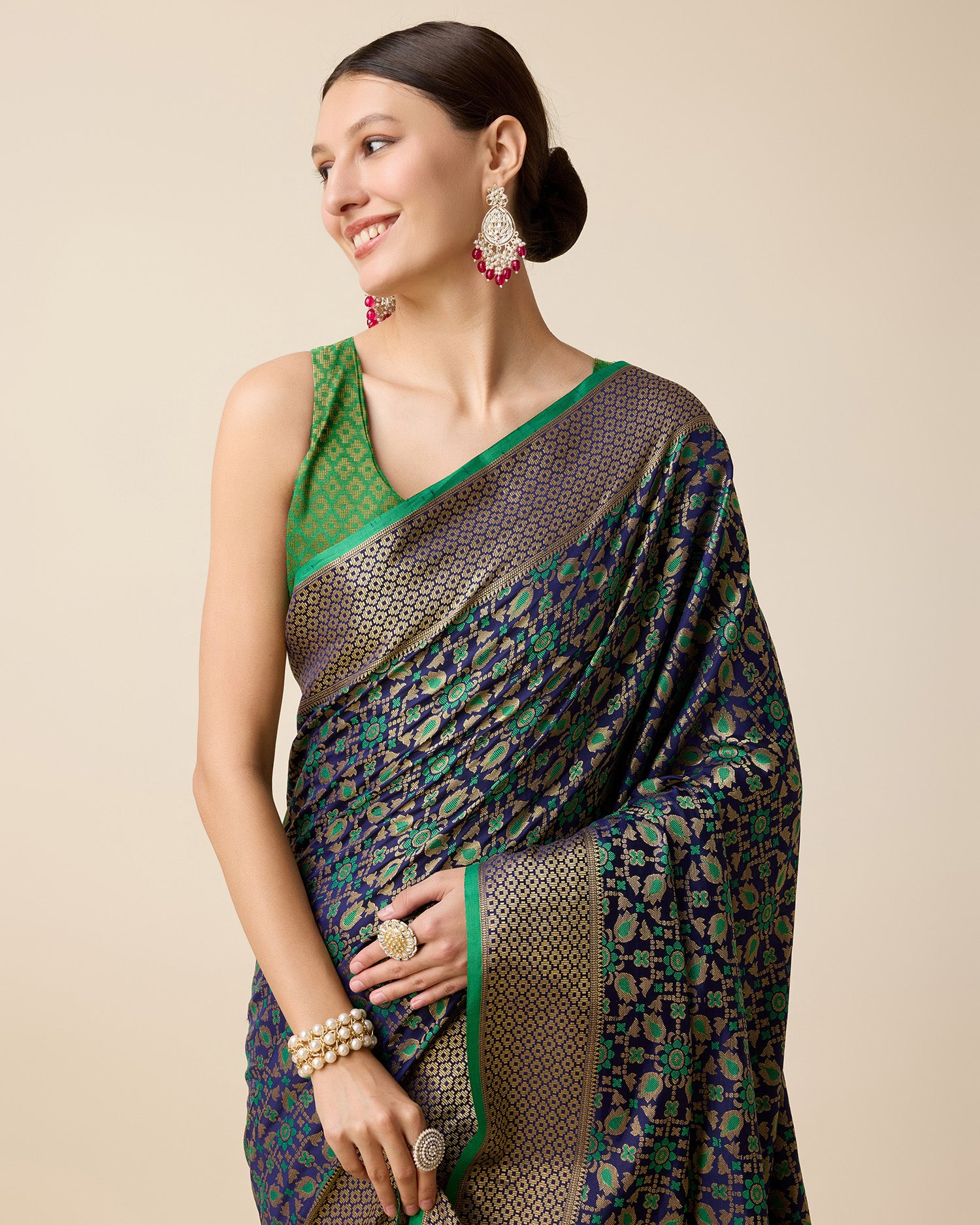 Pure Patola Silk Saree With All Over Contrast Patola Weaved With Contrast Meenakari And Rich Pallu With Tassels Attached Saree in Green - Perfect for Partywear / Bollywood